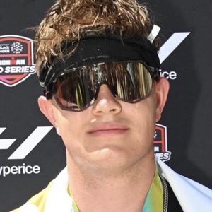 Jaden after a race, medal on