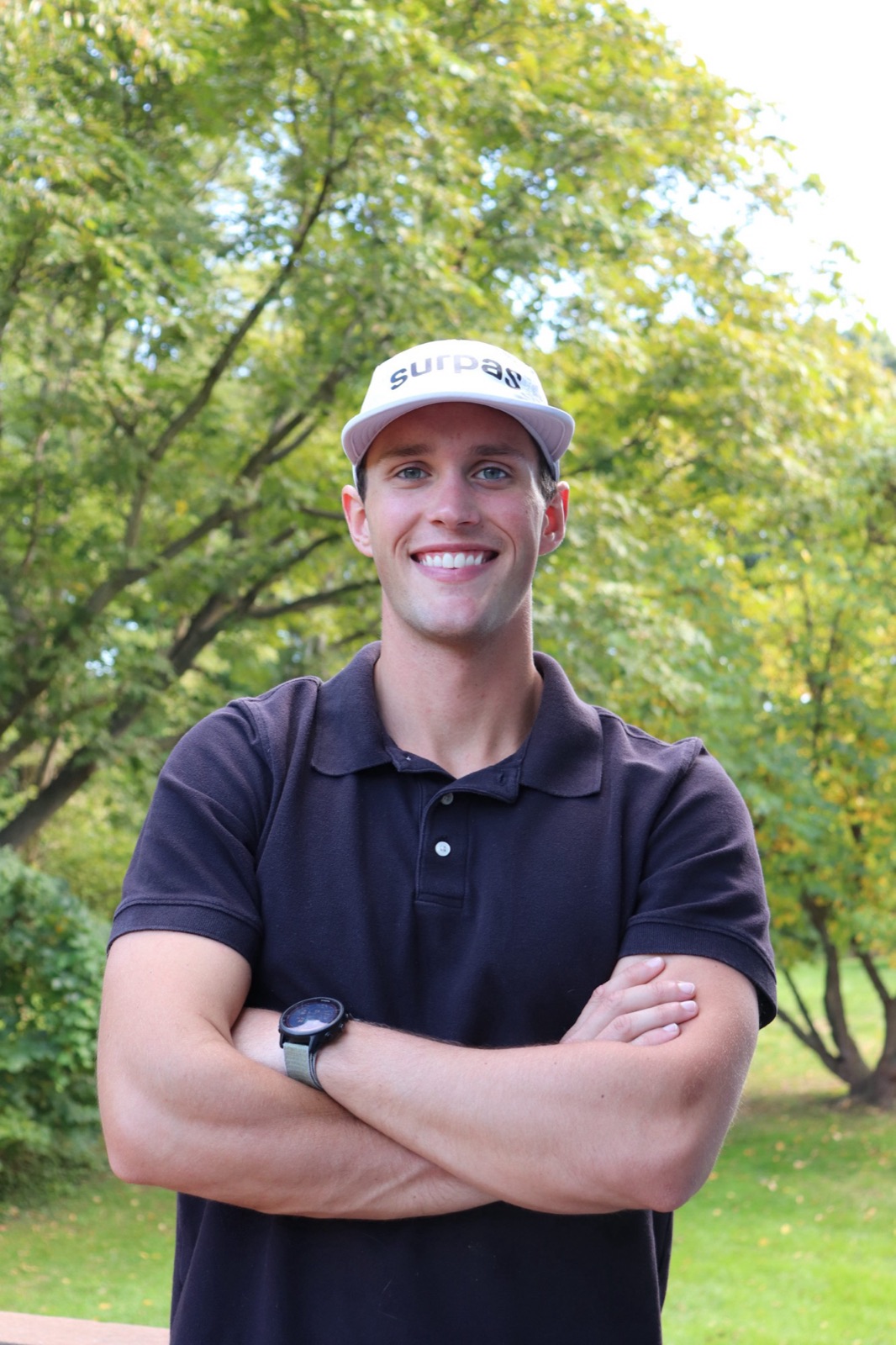 Patrick Kelty, smiling with arms crossed
